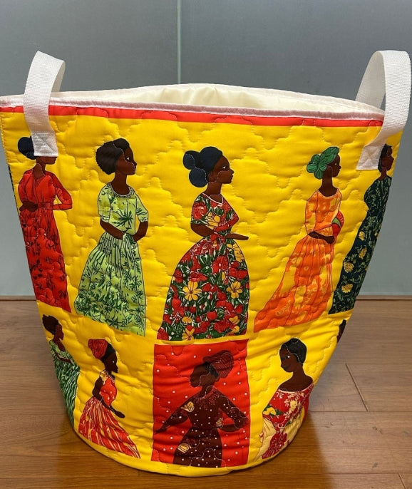 Yellow quilted storage basket from the General Textile Collection