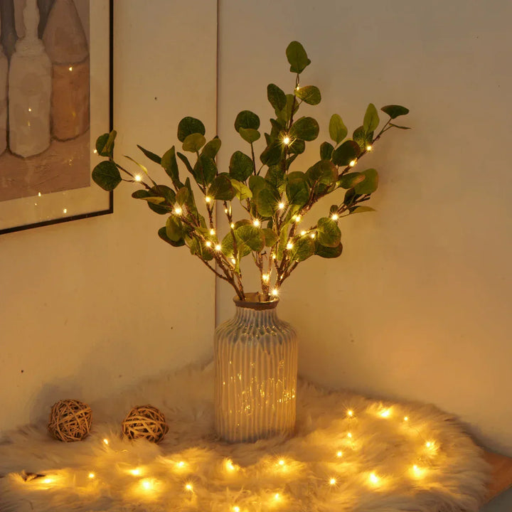 Olive branch with decorative lights